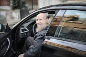Man in Black Leather Jacket in Car