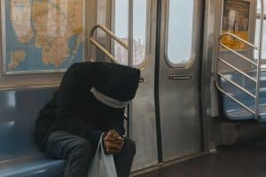 Ce gel des prestations sociales prévu en 2025 pourrait bouleverser des millions de Français Person in Black Hoodie Sitting on Train Bench