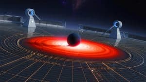Illustration de la fusion de deux trous noirs et de l'émission d'ondes gravitationnelles.